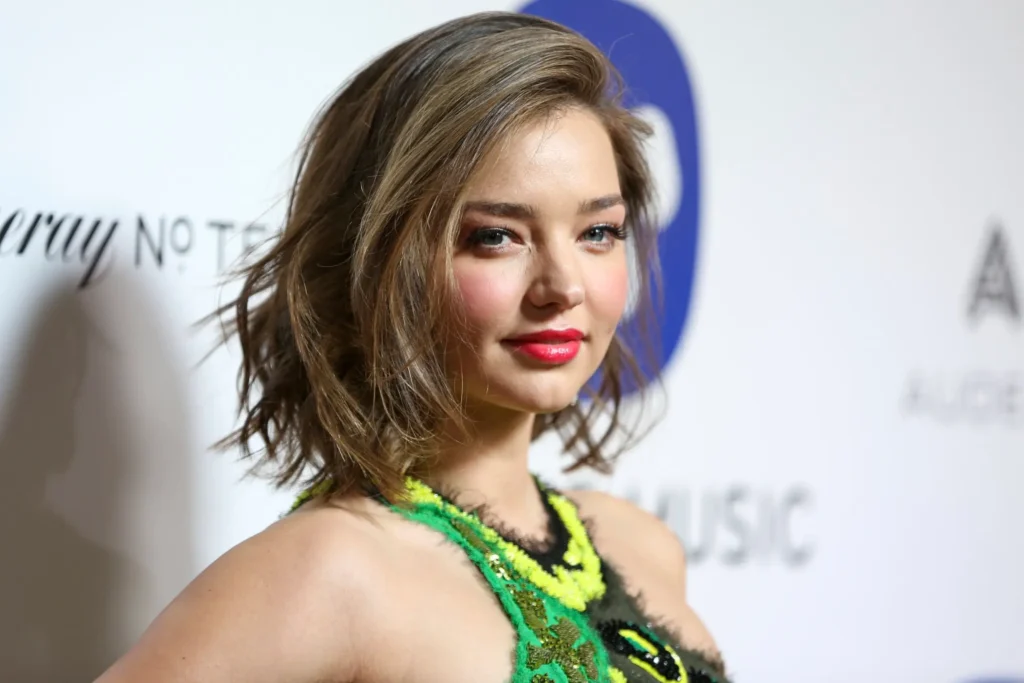 Image of Miranda Kerr, a renowned model and entrepreneur, symbolizing her successful and diverse career in the fashion and business industries.