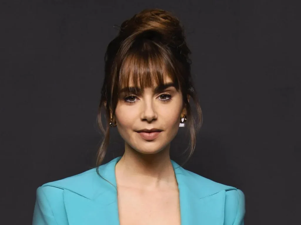 Facts About Lily Collins a radiant figure on the red carpet, encapsulating the essence of her illustrious career in the entertainment industry.