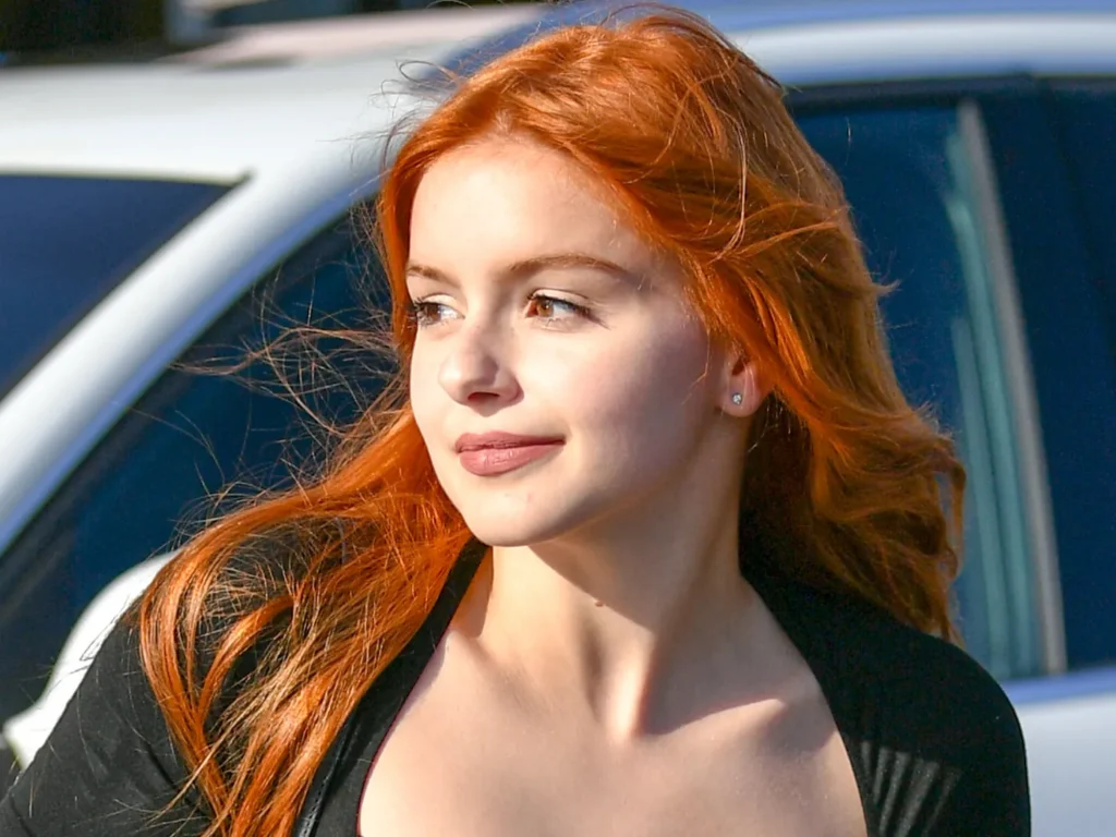 Ariel Winter, surrounded by family and friends, exemplifying the delicate balance between fame and a grounded personal life, emphasizing authenticity and resilience in the public eye.