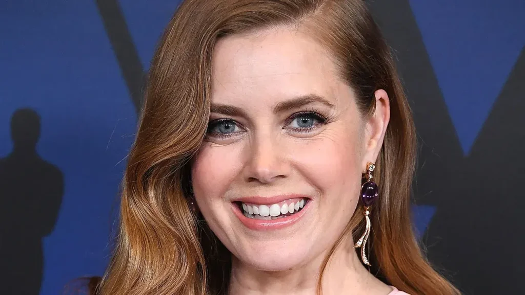 Image featuring Amy Adams confidently portraying empowered female characters on-screen, reflecting her impactful influence on reshaping gender roles in the entertainment industry.