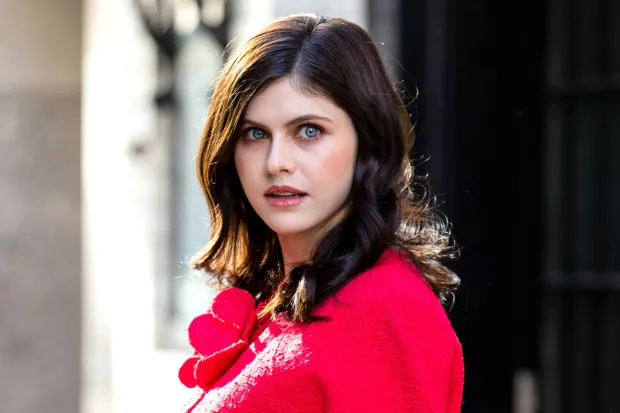Image of Alexandra Daddario confidently handling media interviews and public appearances with grace.