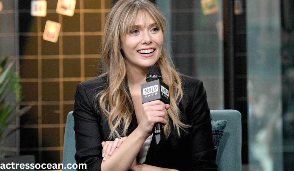 Elizabeth Olsen smiling in a candid shot, hinting at her future projects and ambitions.