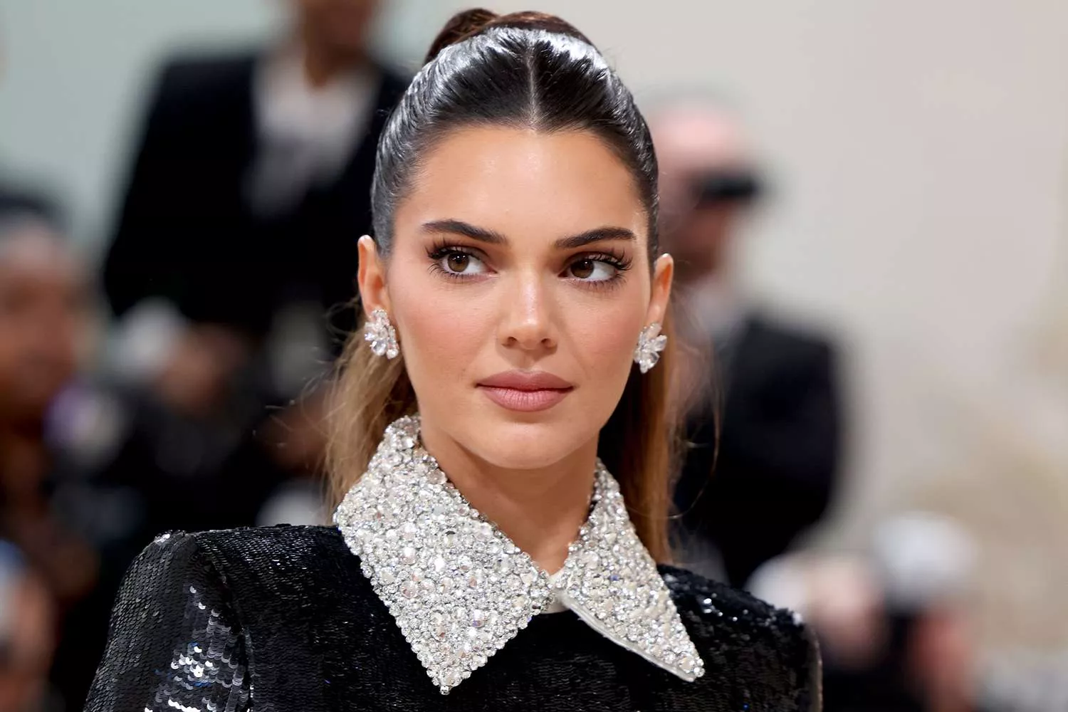 Image featuring Kendall Jenner, adorned with stylish elegance, accompanying a compilation of intriguing facts about her life and career.
