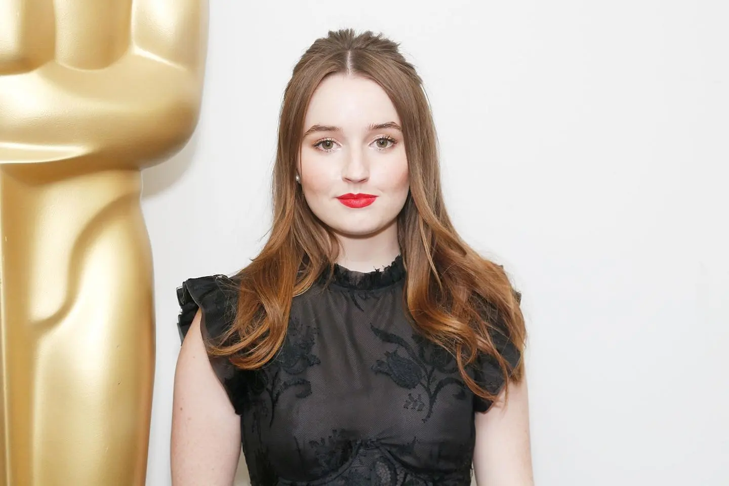 An engaging image of Kaitlyn Dever, with the caption highlighting the exploration of intriguing facts about the talented actress, adding a layer to her enigmatic charm.